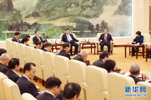 ͼΪ��2017��1��22�գ�ϰ��ƽ�����������Ÿ������ڱ�����������ͬ������ʿ����һ�ã���ӭ�ѽڡ�