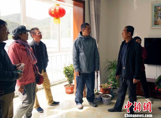 61���������(��һ)�����Ĵ������ڱ�������ũ�塣���ҵĶ������С¥���пյ������еذ��ů��ͼΪ�������ڼ��н�������ý����߼���ɷá����½� ��